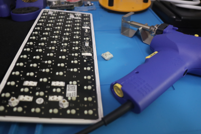Switches exposed, one switch removed with Hakko FR-301 in picture.